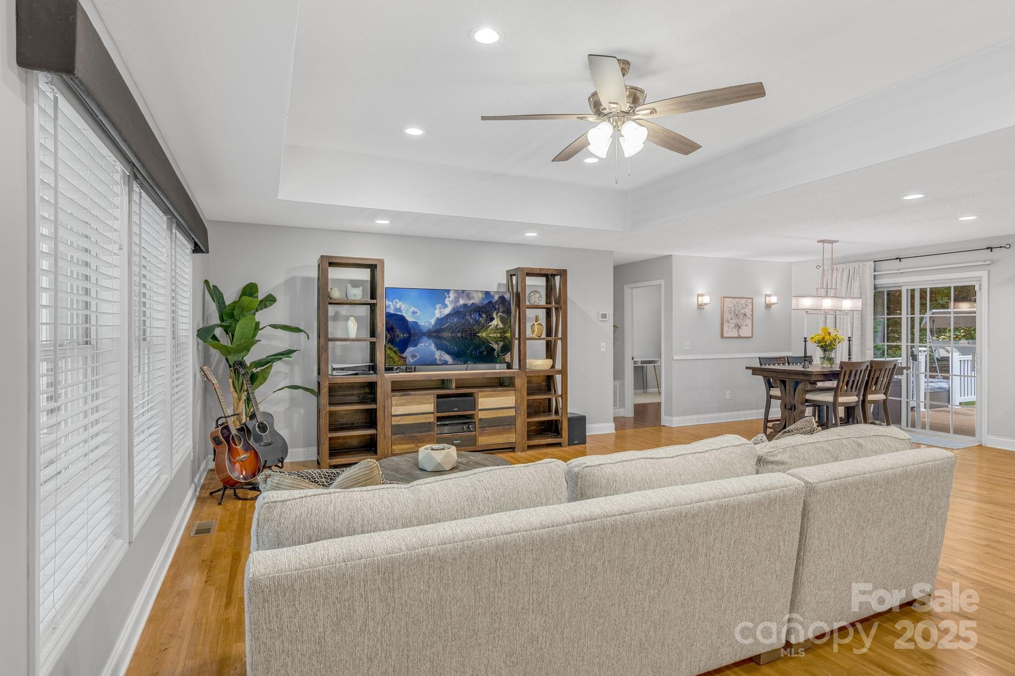 904 Mills Gap Road Fletcher, NC 28732 - Photo 5 of 36 a living room with furniture and a potted plant