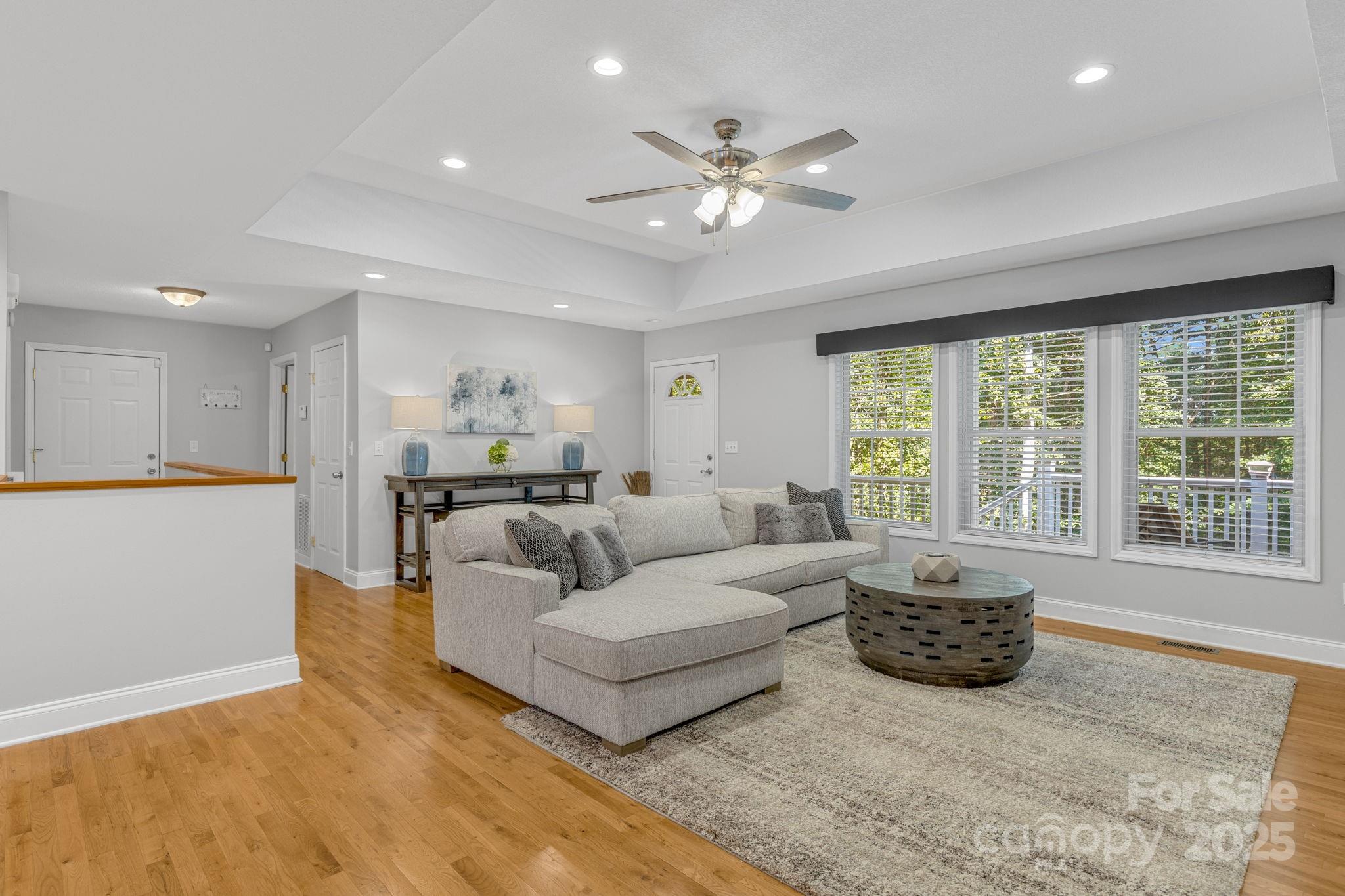 904 Mills Gap Road Fletcher, NC 28732 - Photo 7 of 36 a living room with furniture and a large window