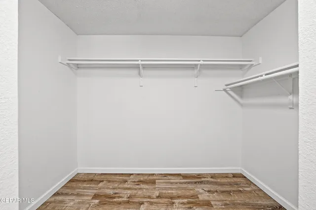 a view of a room with racks on the wall