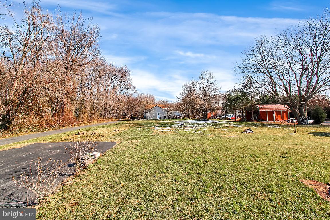 333 Back River Neck Road Baltimore, MD 21221 - Photo 20 of 25 a view of a swimming pool with an outdoor space and seating area