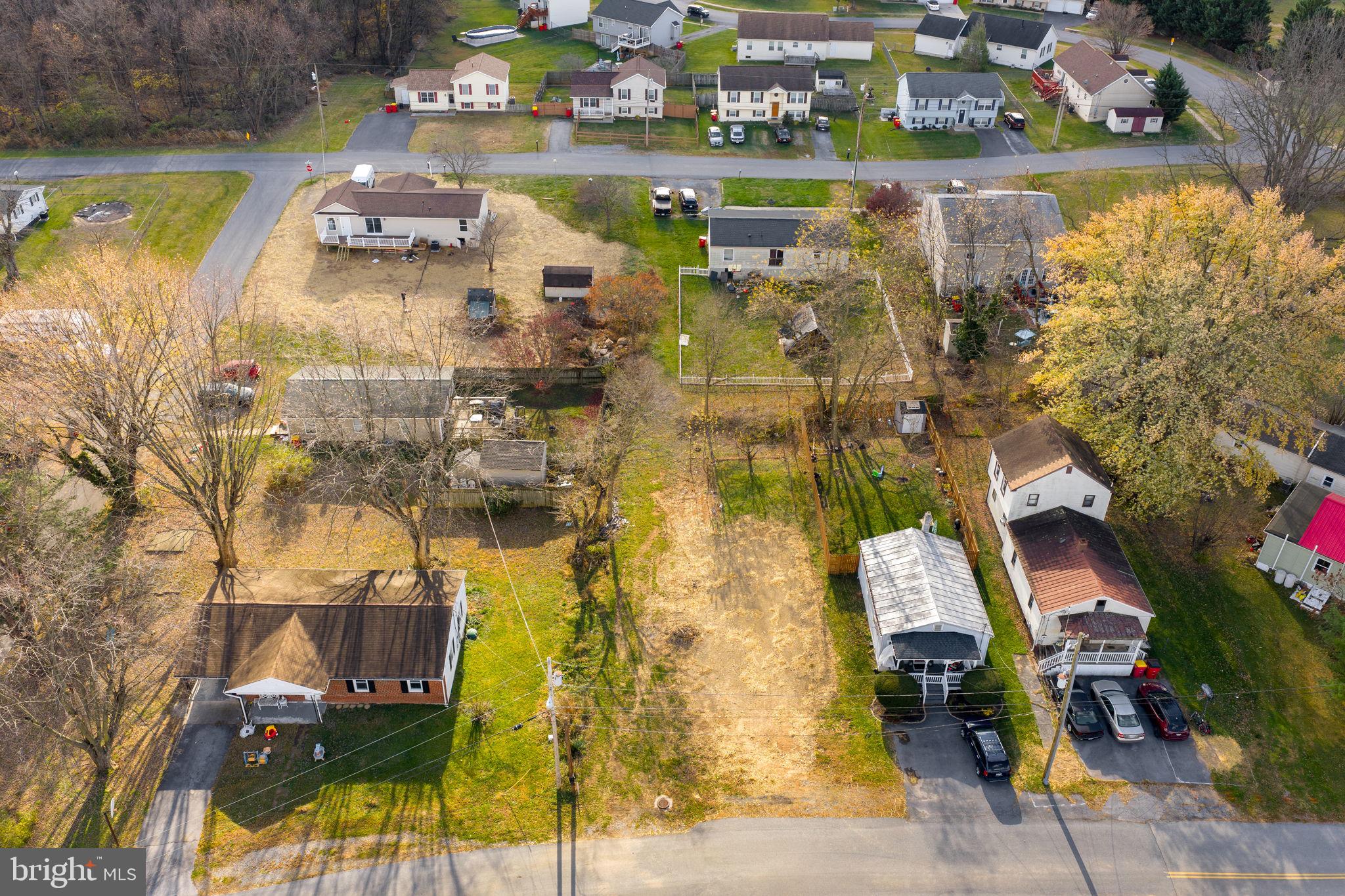 406 East 11th Avenue Ranson, WV 25438 - Photo 14 of 21 an aerial view of residential houses with outdoor space