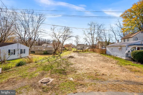 a view of yard covered with snow