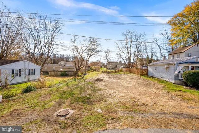 a view of yard covered with snow