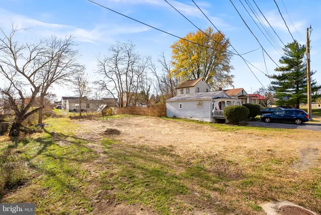 a view of a street with a building in the background