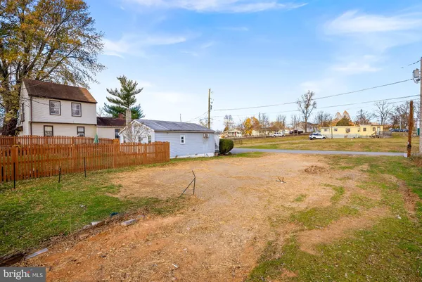 a house with swimming pool in front of it