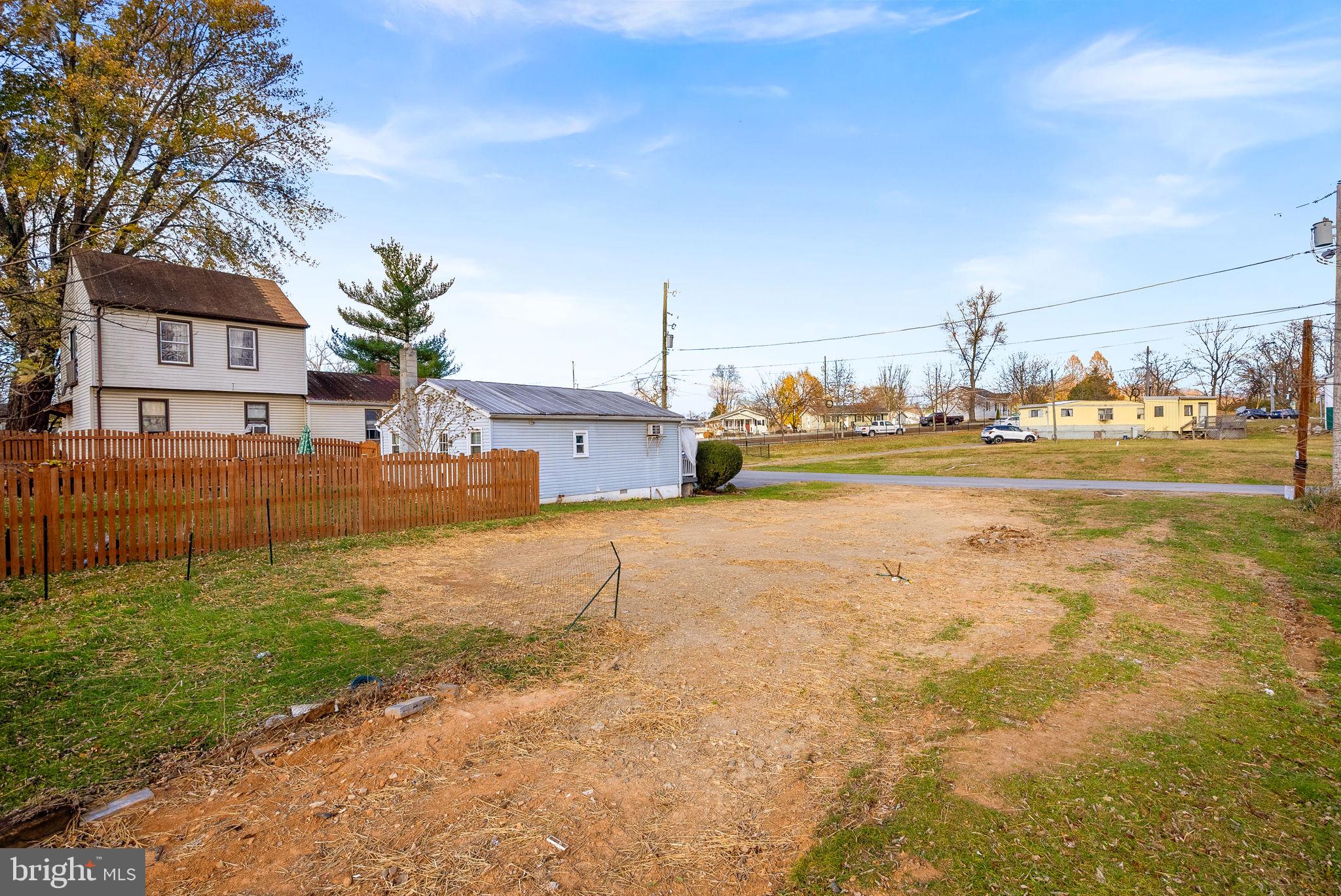 406 East 11th Avenue Ranson, WV 25438 - Photo 6 of 21 a house with swimming pool in front of it