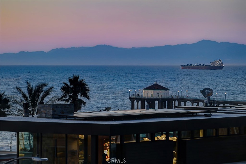 a view of a terrace with a lake view