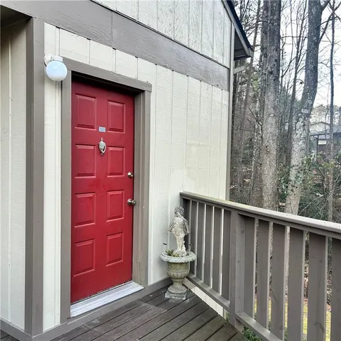 a view of porch with wooden floor