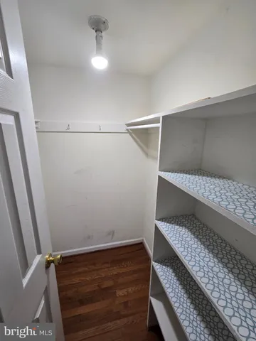 a view of small space with racks on the wall