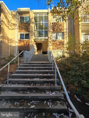 a view of building with wooden floor and windows