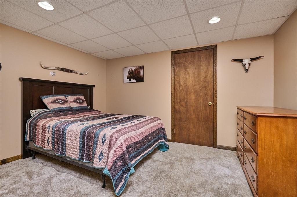 14 East Hawley Road Charlemont, MA 01339 - Photo 32 of 42 a bedroom with a bed and a walk in closet