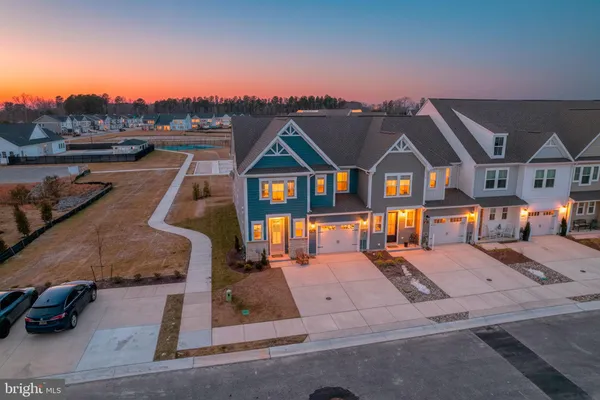 a front view of a house with a ocean view