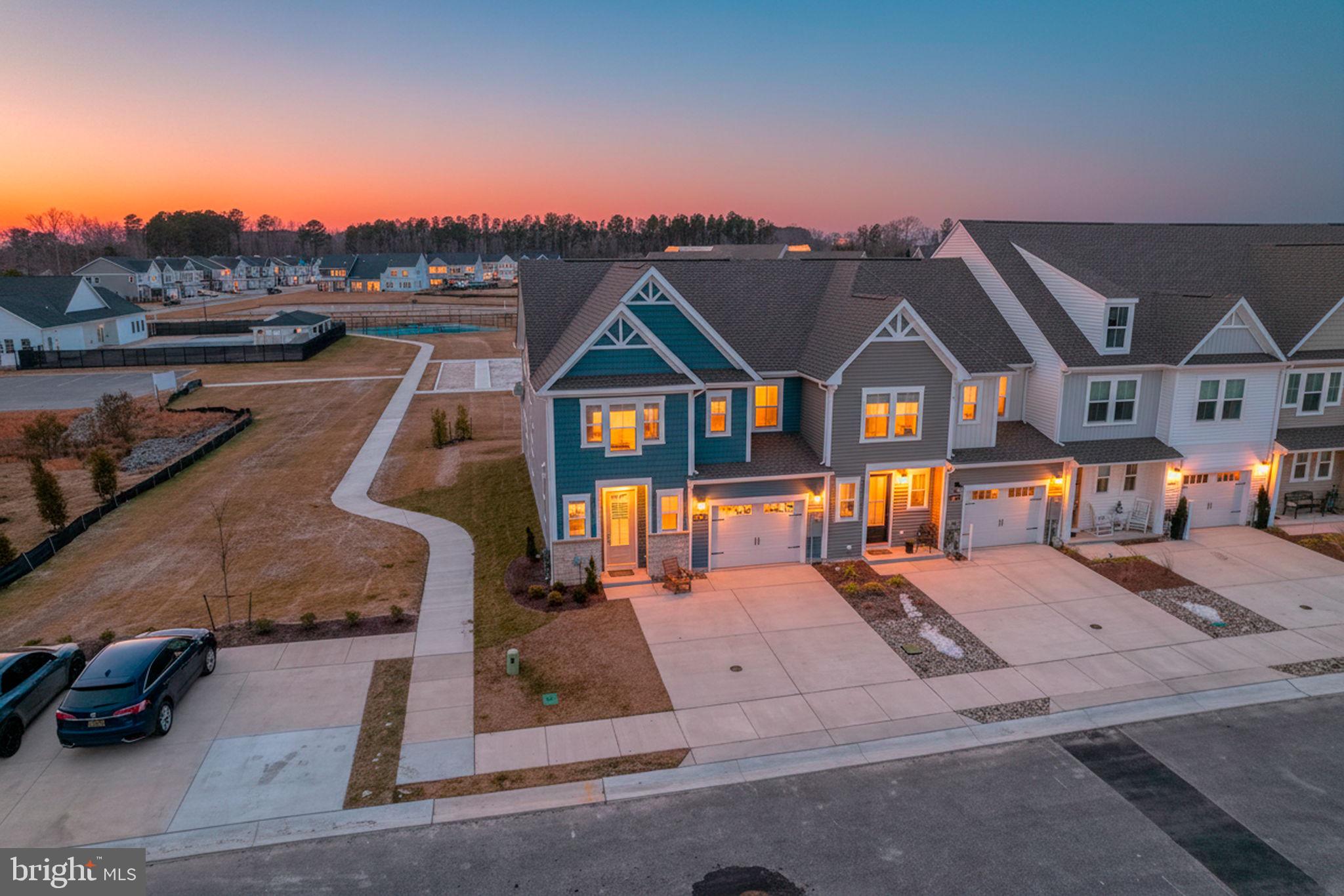 a front view of a house with a ocean view