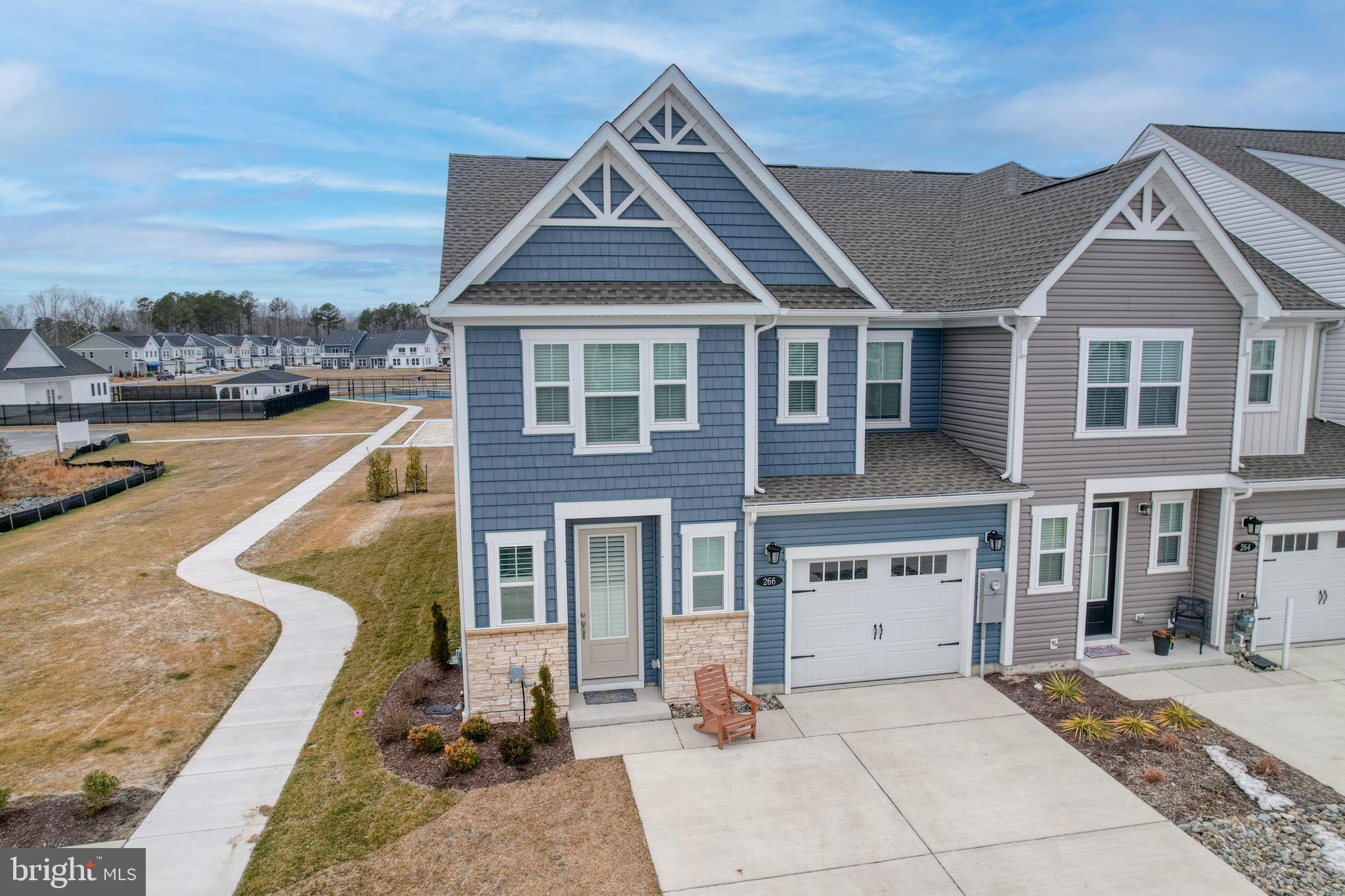 266 Exeter Street Ocean View, DE 19970 - Photo 2 of 62 a front view of a house with a yard