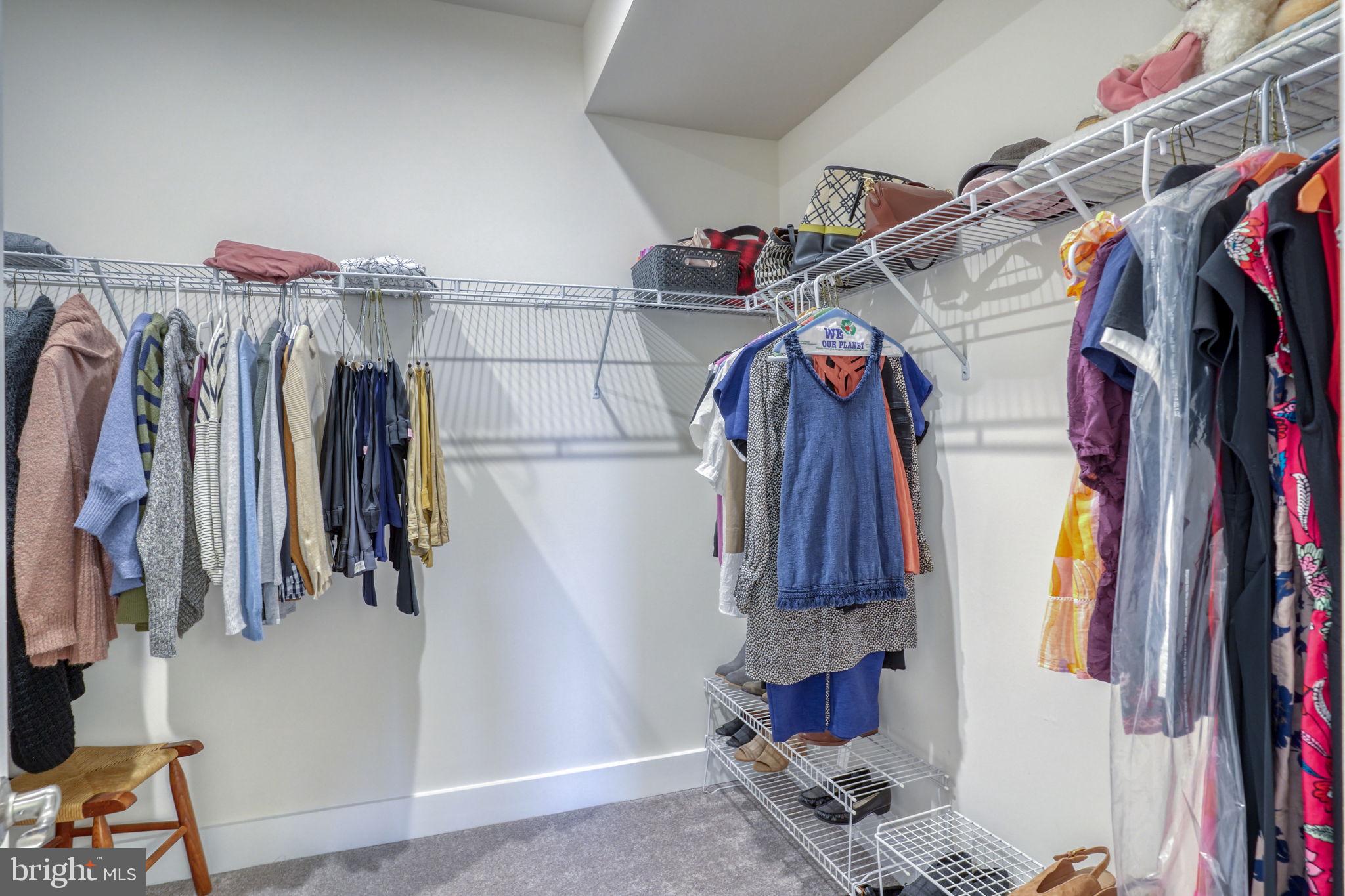 266 Exeter Street Ocean View, DE 19970 - Photo 24 of 62 a view of walk in closet with clothes