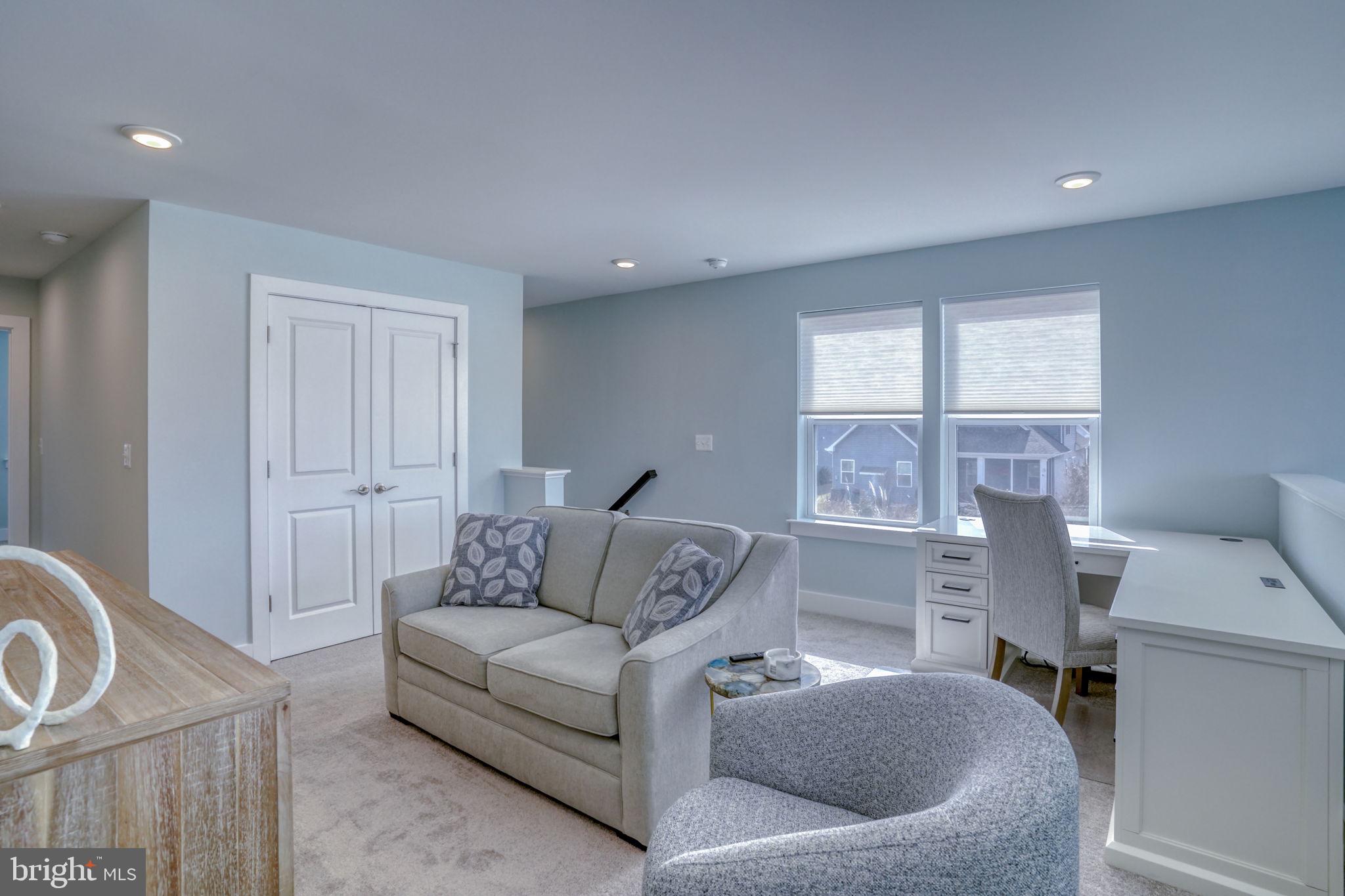 266 Exeter Street Ocean View, DE 19970 - Photo 28 of 62 a living room with furniture and a window