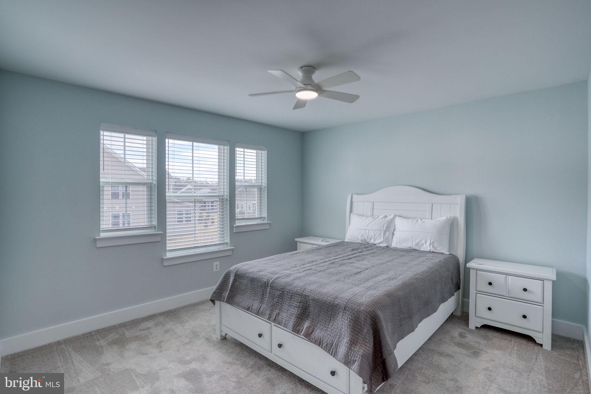 266 Exeter Street Ocean View, DE 19970 - Photo 31 of 62 a bedroom with a bed and a window