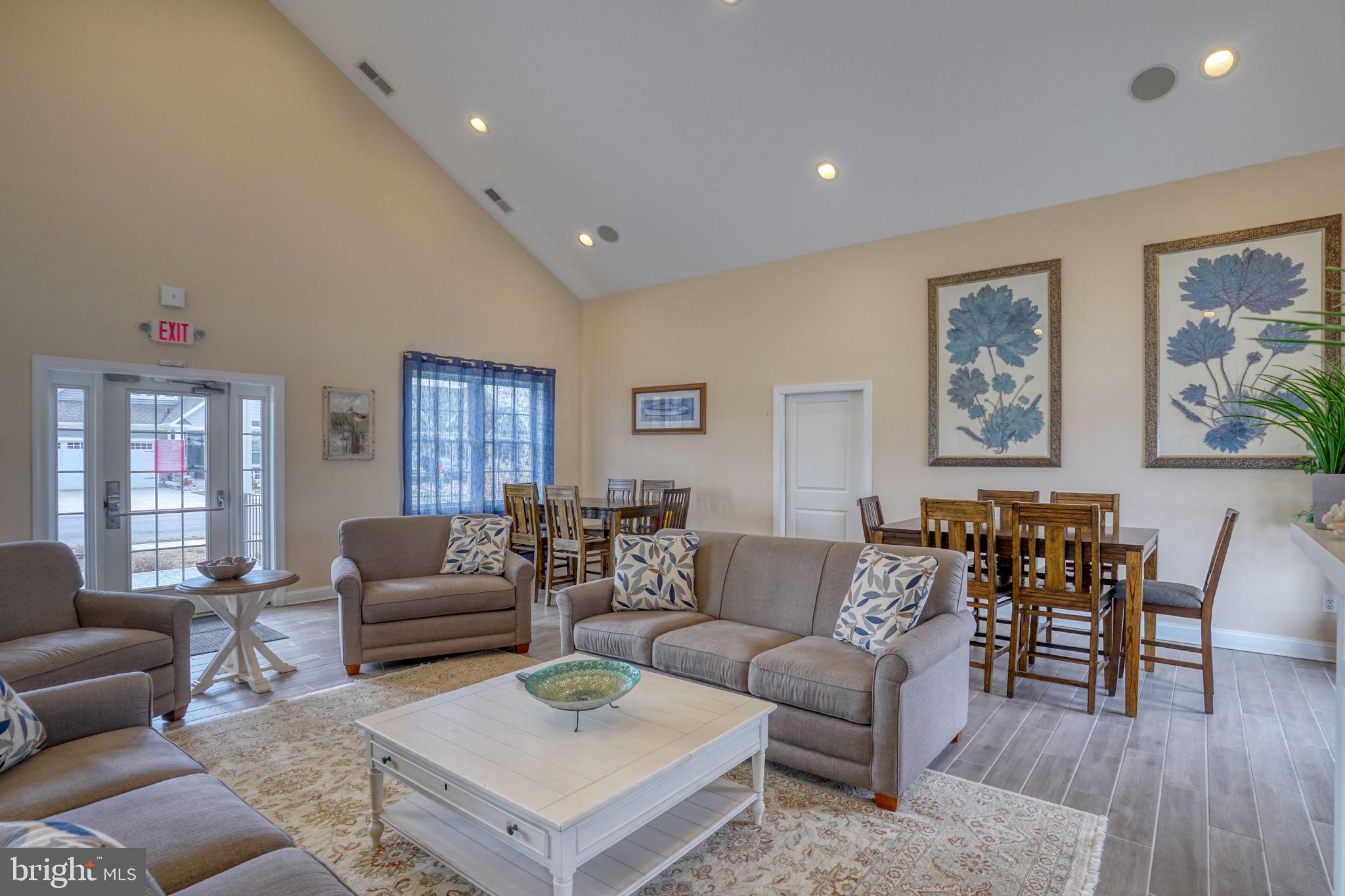 266 Exeter Street Ocean View, DE 19970 - Photo 42 of 62 a living room with furniture and wooden floor