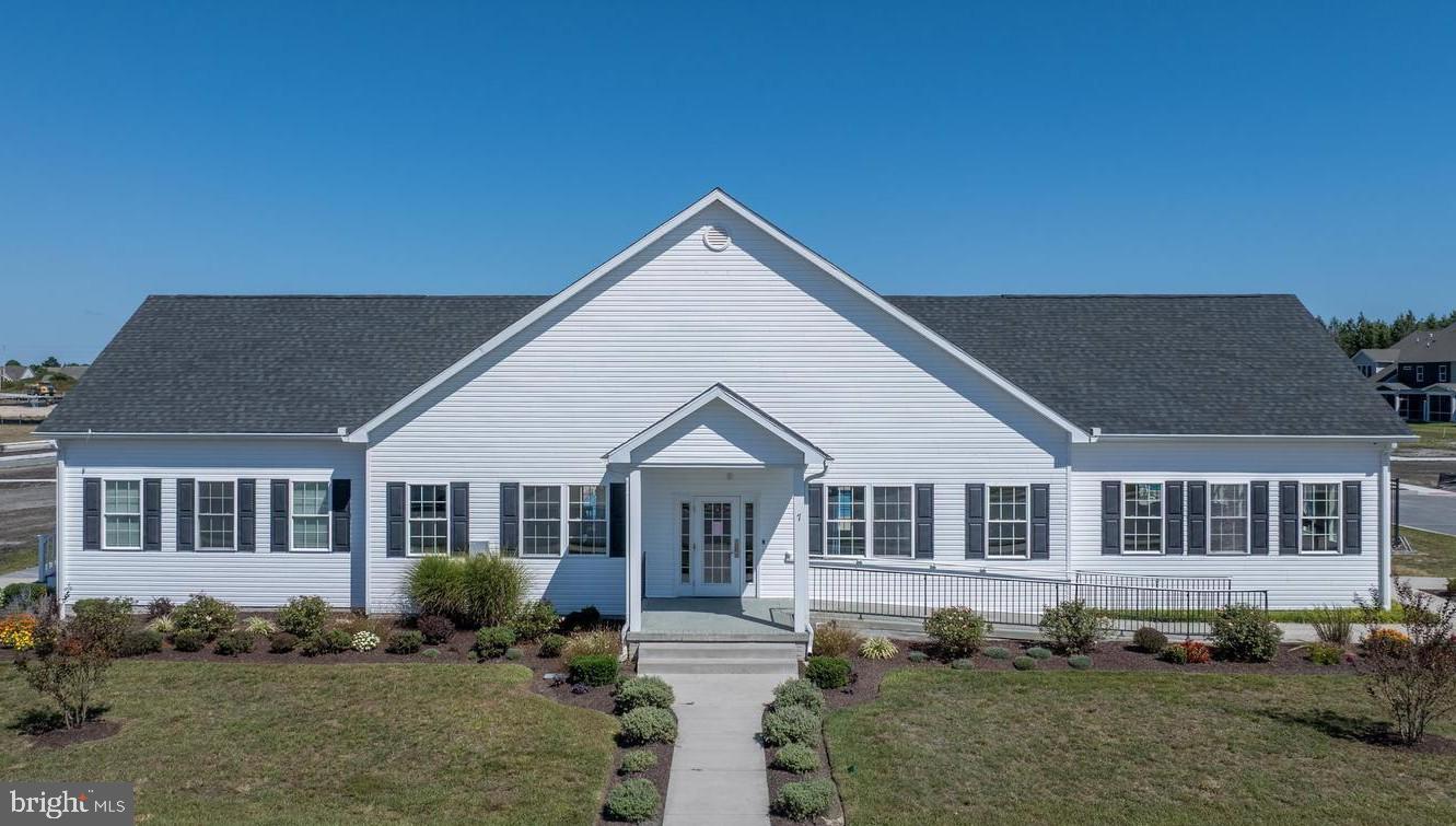 266 Exeter Street Ocean View, DE 19970 - Photo 47 of 62 a front view of a house with a yard