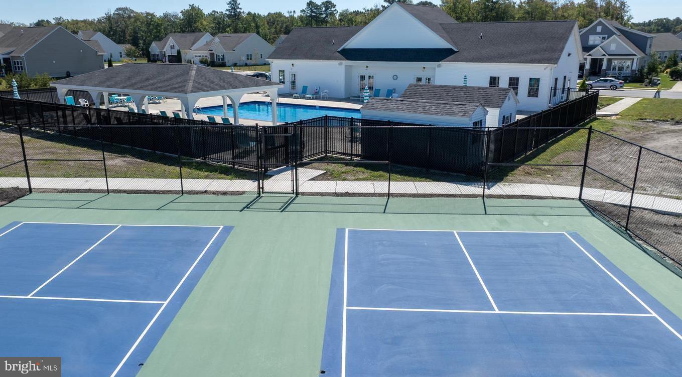 266 Exeter Street Ocean View, DE 19970 - Photo 50 of 62 a front view of a house with a yard