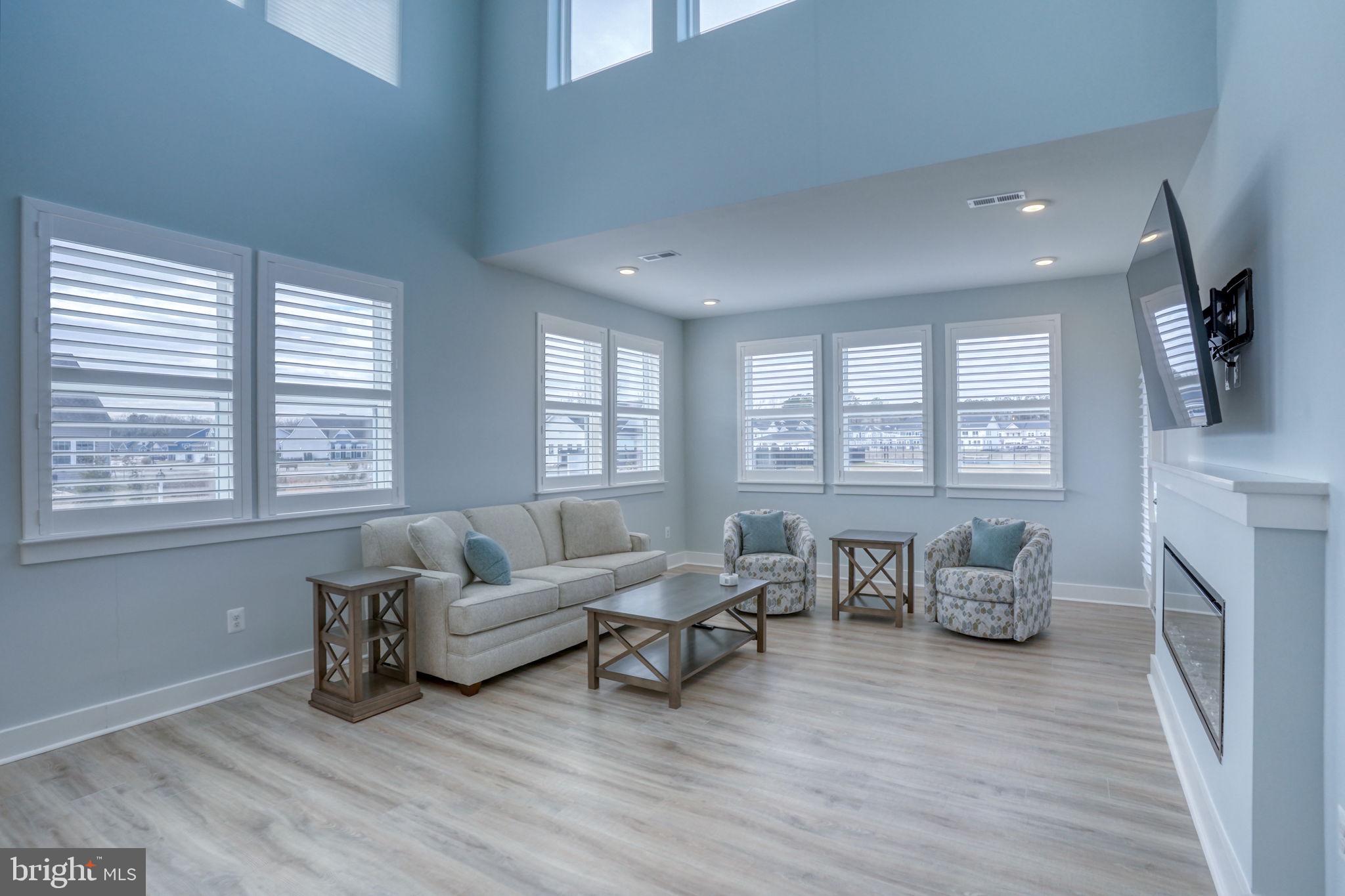 266 Exeter Street Ocean View, DE 19970 - Photo 7 of 62 a living room with furniture and a window