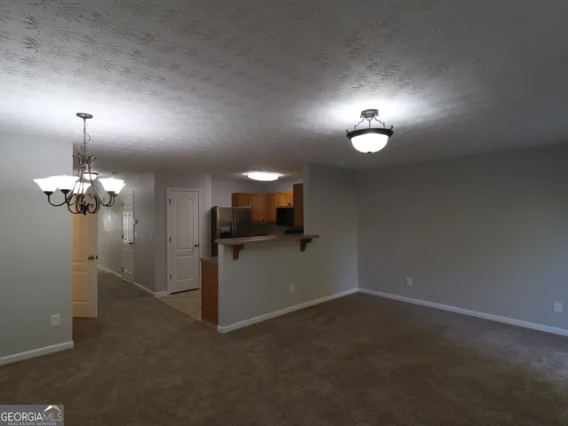 a view of a room with a furniture