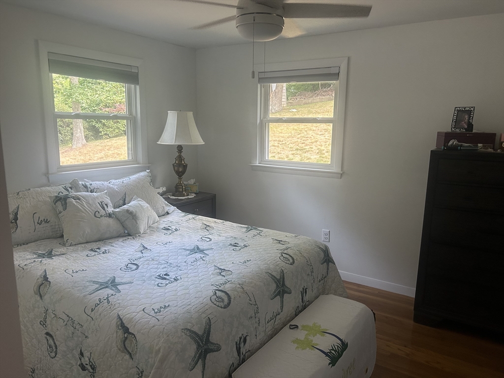 48 Smiths Lane Kingston, MA 02364 - Photo 14 of 22 a bedroom with a bed and a window