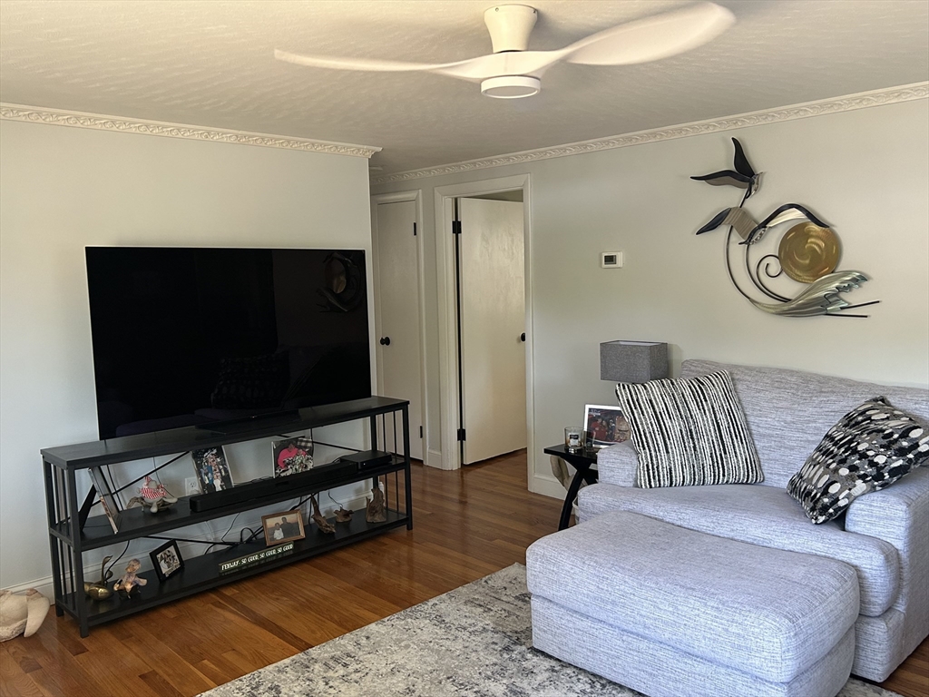 48 Smiths Lane Kingston, MA 02364 - Photo 15 of 22 a living room with furniture and a flat screen tv