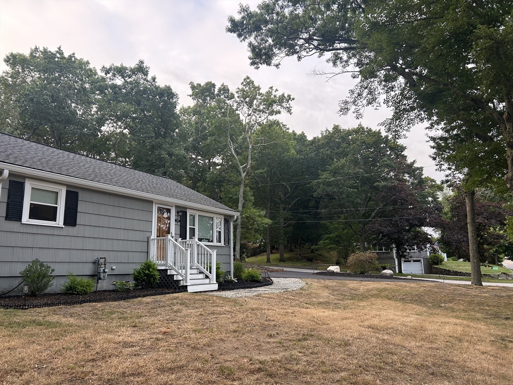 48 Smiths Lane Kingston, MA 02364 - Photo 19 of 22 a view of a house with a tree in the background