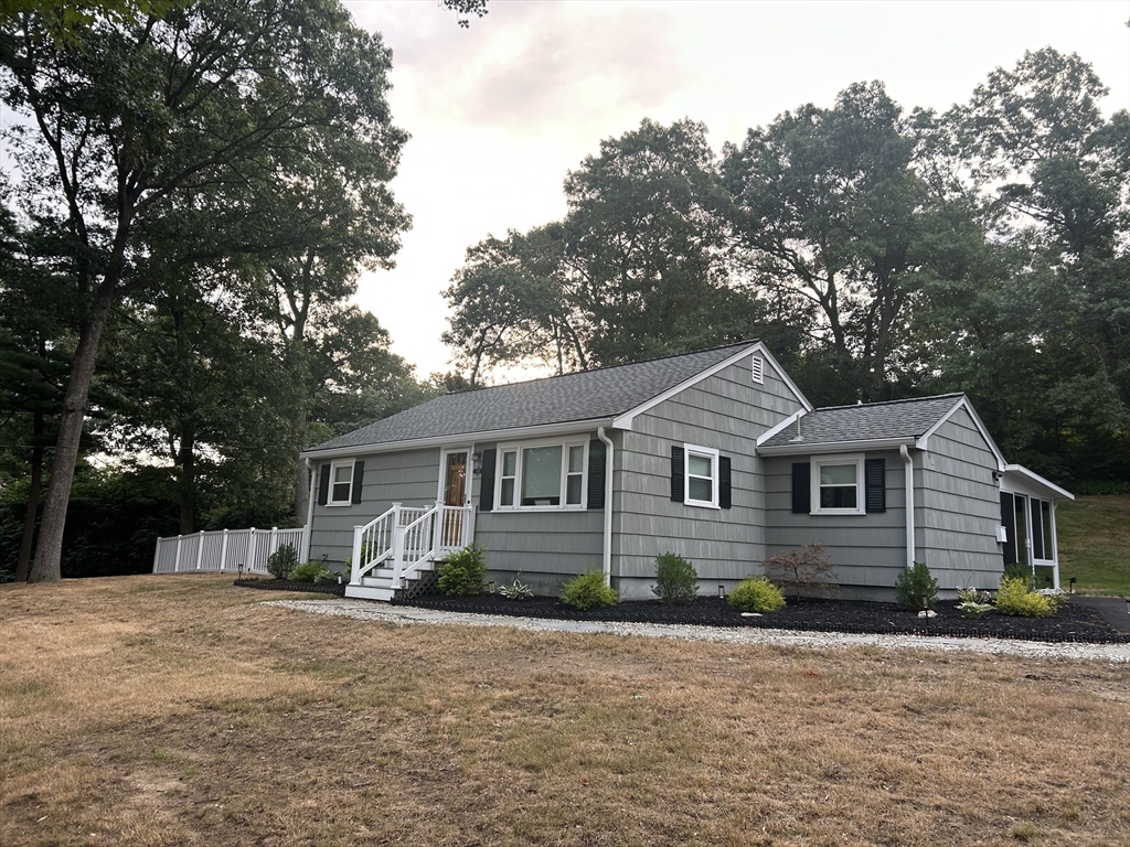 48 Smiths Lane Kingston, MA 02364 - Photo 22 of 22 front view of a house with a yard