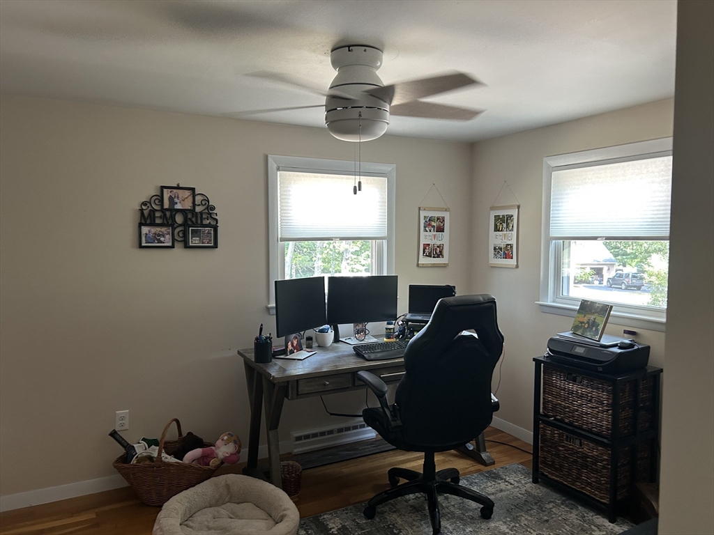 48 Smiths Lane Kingston, MA 02364 - Photo 9 of 22 a view of a workspace with furniture and a window
