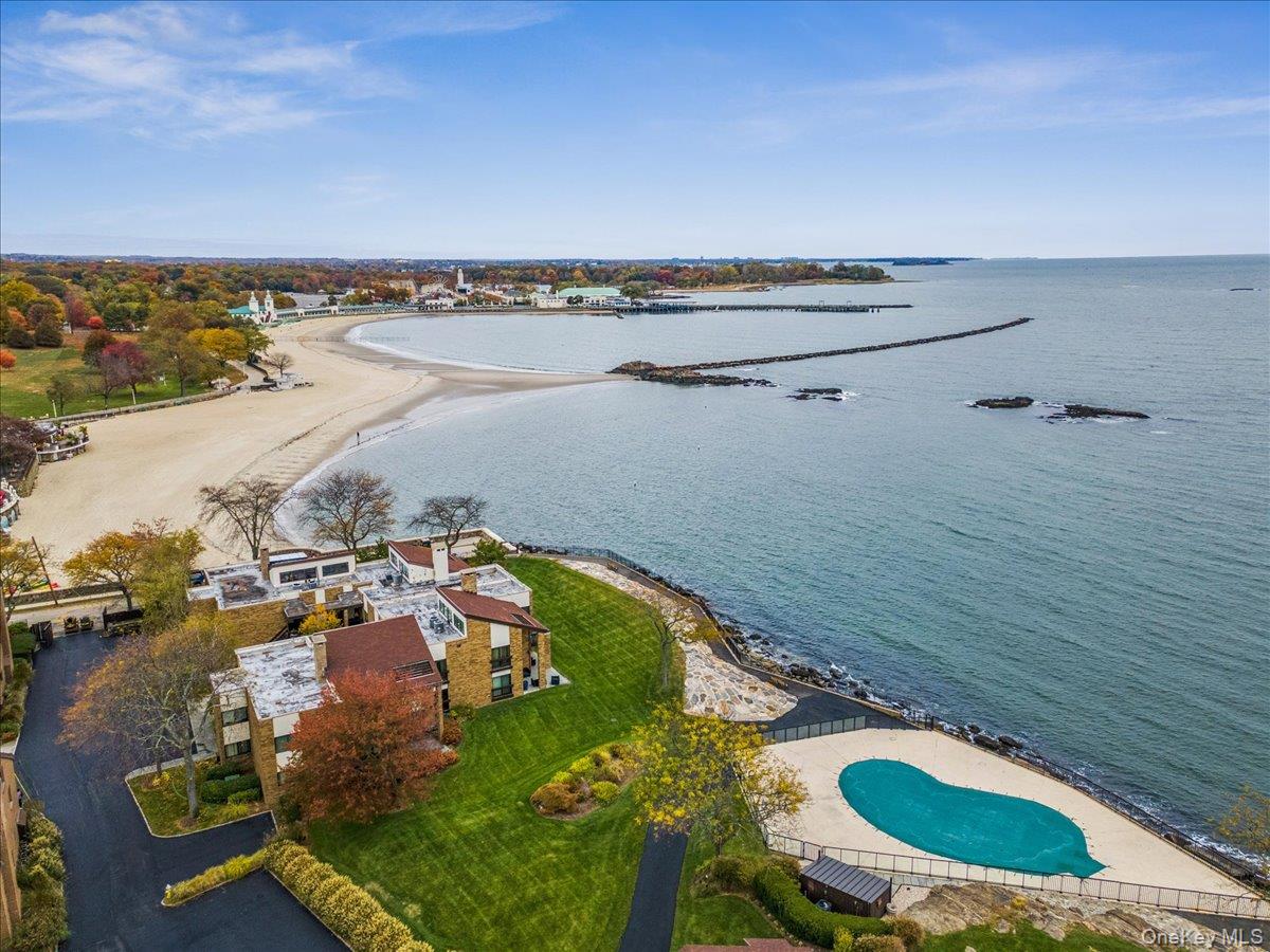 Aerial view of a Long Island Sound and a pool area