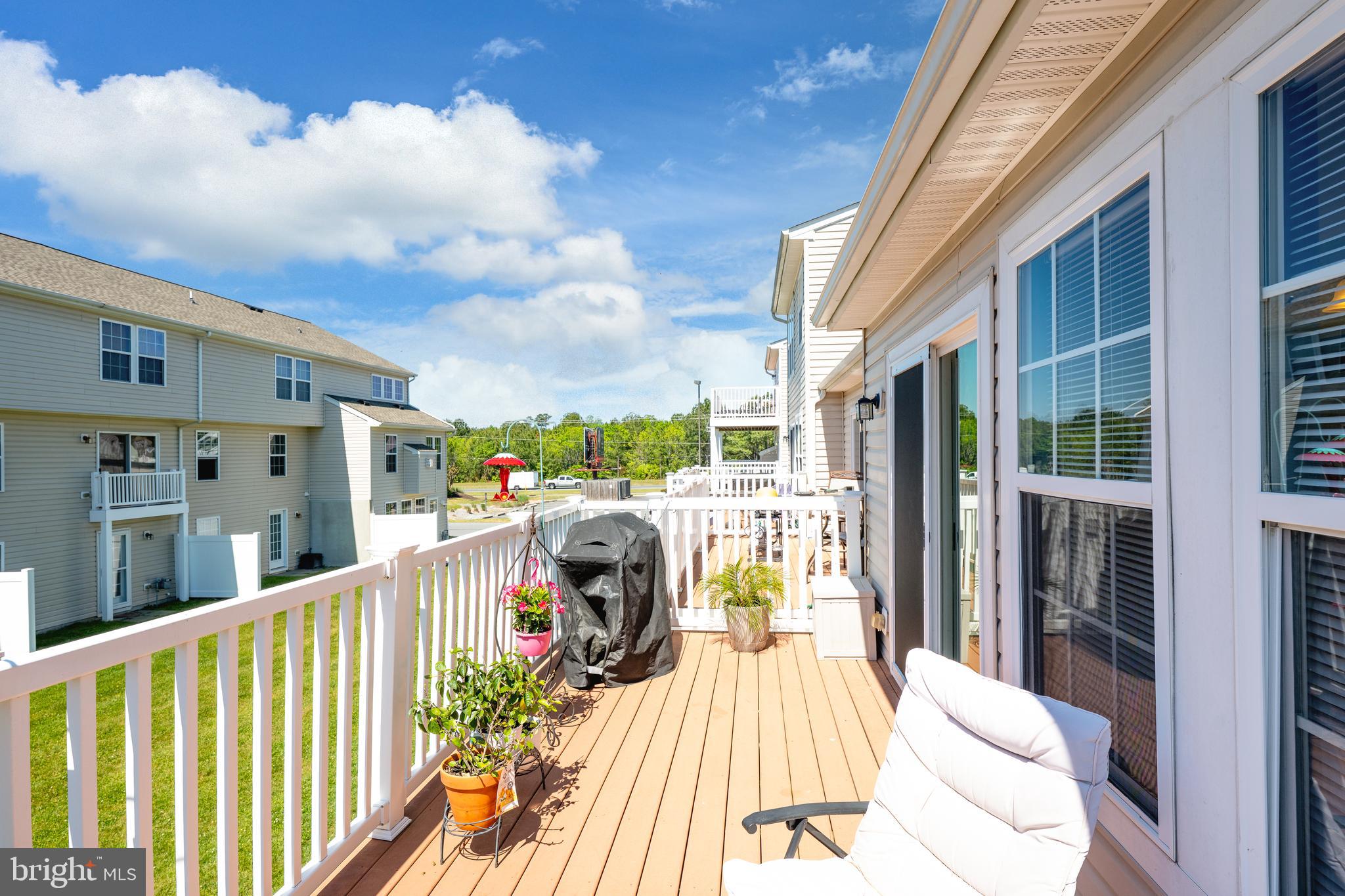 27548 Mayfield Road, Unit 42 Millsboro, DE 19966 - Photo 36 of 46 a view of balcony with furniture