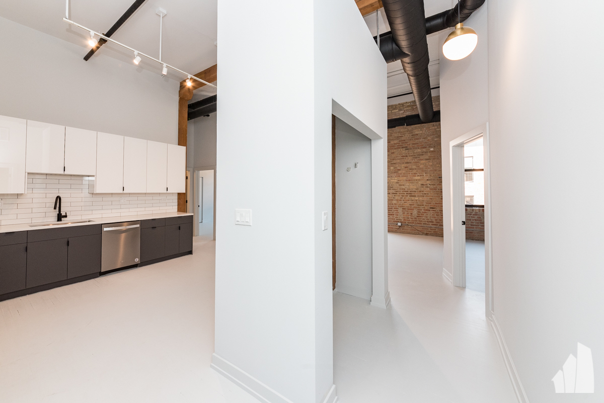 213 North Racine Avenue, Unit 303 Chicago, IL 60607 - Photo 2 of 18 a view of a kitchen with a sink and cabinets