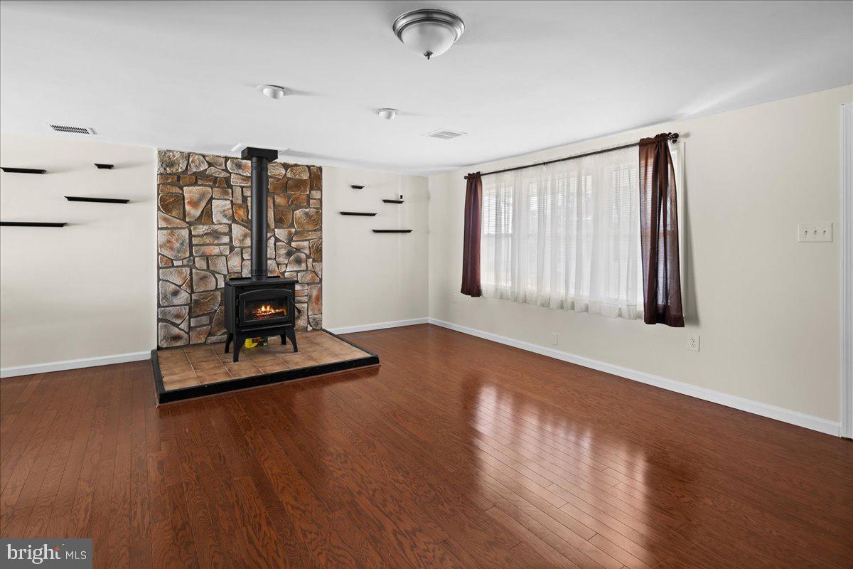 1108 Rudder Avenue Manahawkin, NJ 08050 - Photo 4 of 28 Free Standing Wood Fireplace