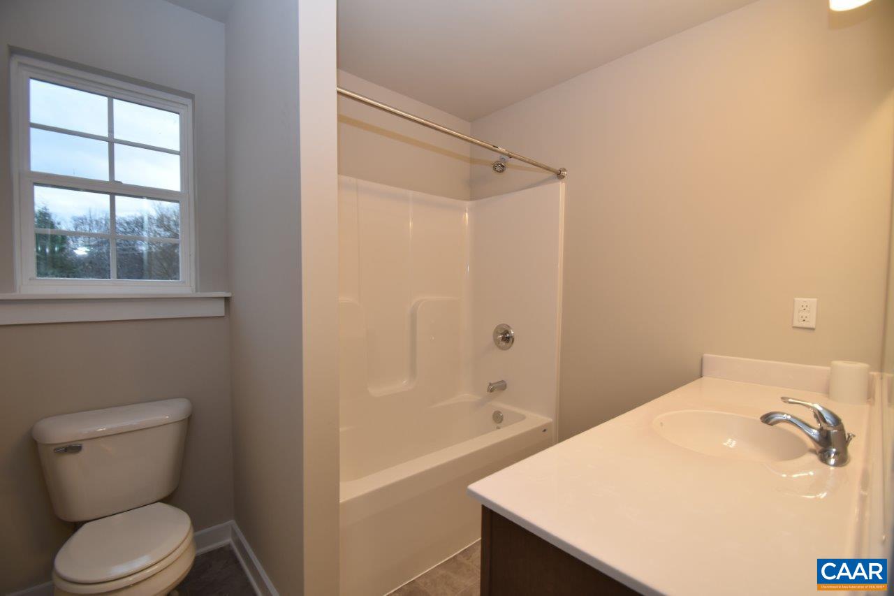 1140 Hanback Road Gordonsville, VA 22942 - Photo 12 of 16 a bathroom with a sink a toilet and shower