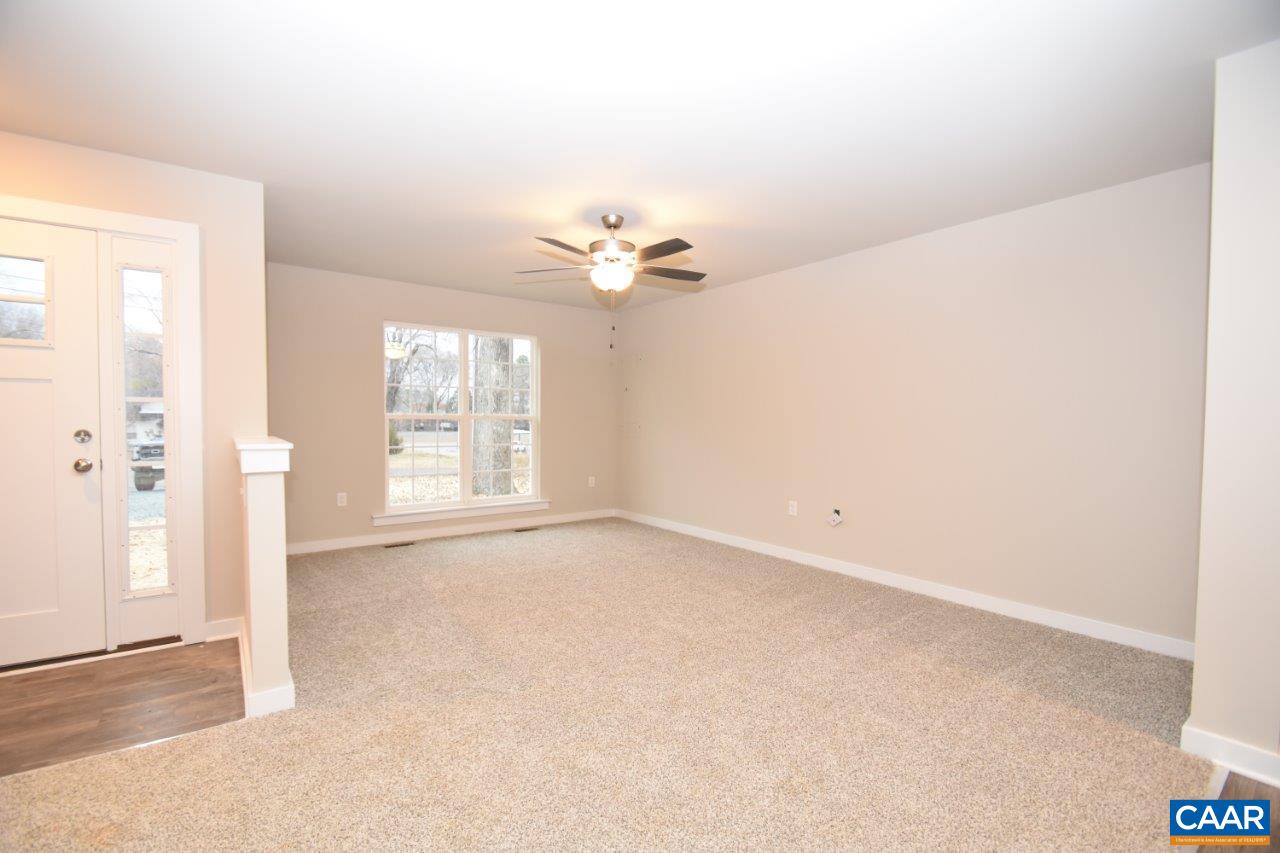 1140 Hanback Road Gordonsville, VA 22942 - Photo 6 of 16 wooden floor in an empty room with a window
