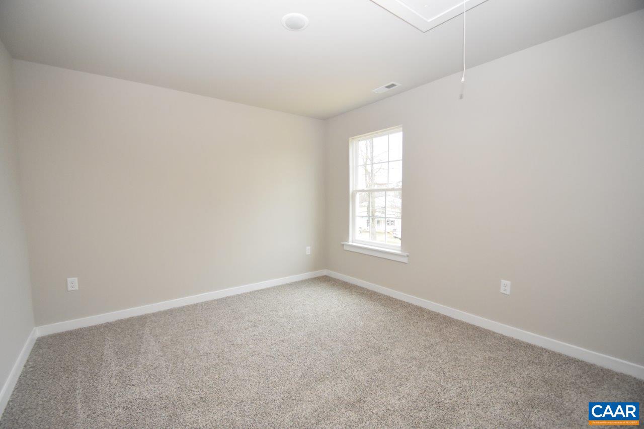 1140 Hanback Road Gordonsville, VA 22942 - Photo 9 of 16 an empty room with windows