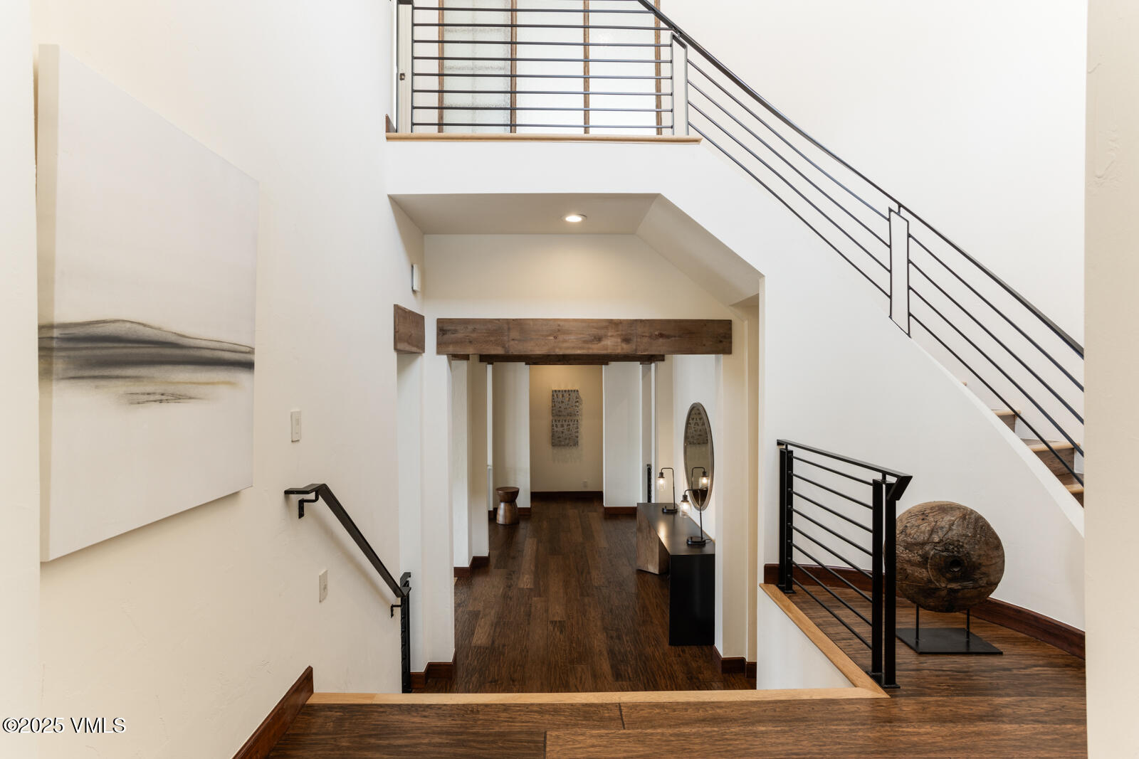 141 Corral Road, Unit A Edwards, CO 81632 - Photo 19 of 51 a view of a hallway with wooden floor and staircase