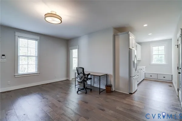 a view of backyard with sitting area