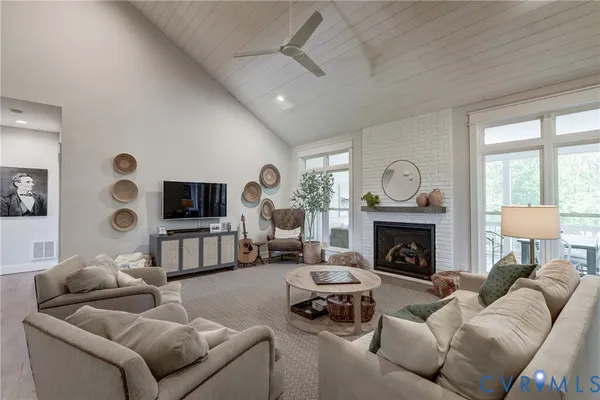 a kitchen with lots of counter space and wooden floor