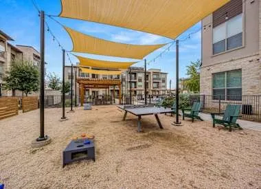 a view of a park with chairs