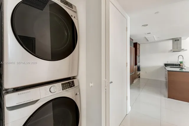 a view of a storage & utility room with washer and dryer