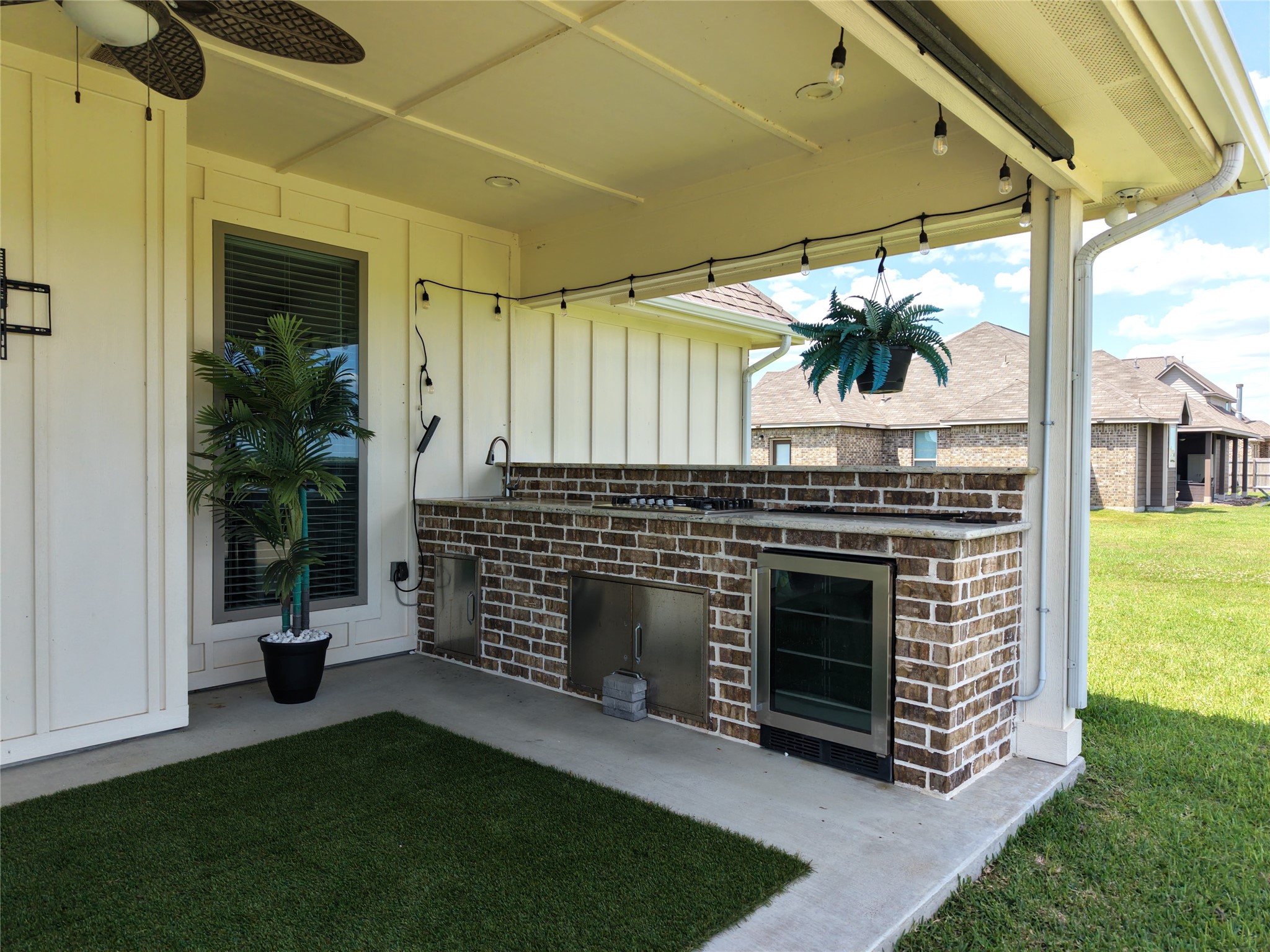 2295 Diamond D Lane Beaumont, TX 77713 - Photo 36 of 40 a kitchen view with a fireplace and outdoor space