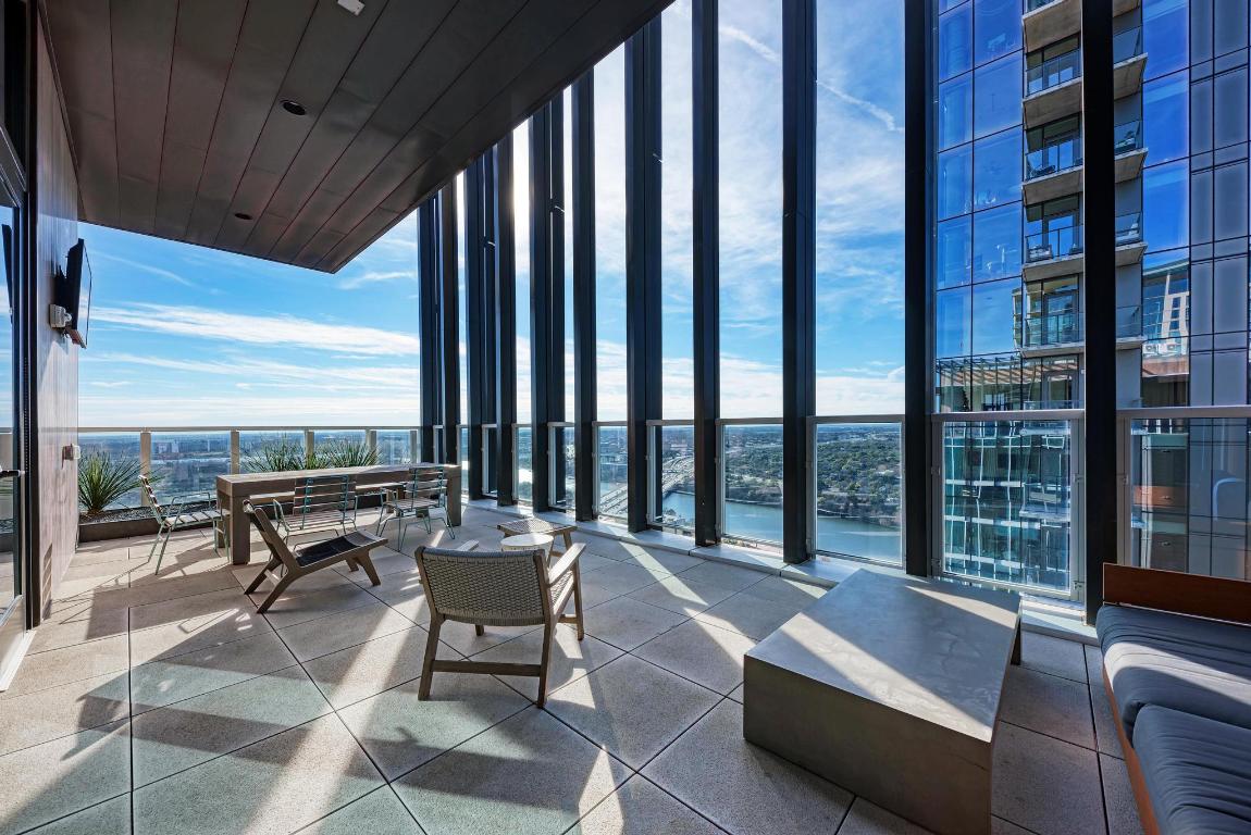 48 East Avenue, Unit 2802 Austin, TX 78701 - Photo 23 of 38 a building outdoor space with patio furniture and a patio