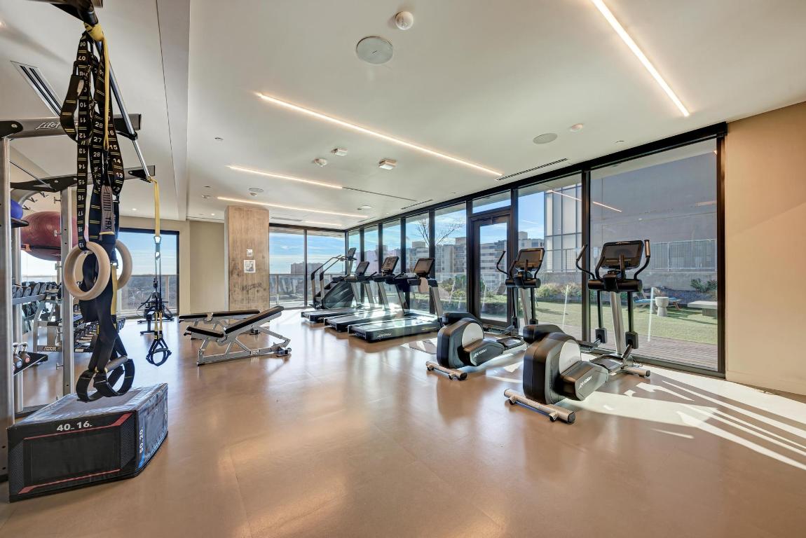 48 East Avenue, Unit 2802 Austin, TX 78701 - Photo 24 of 38 a view of a room with gym equipment