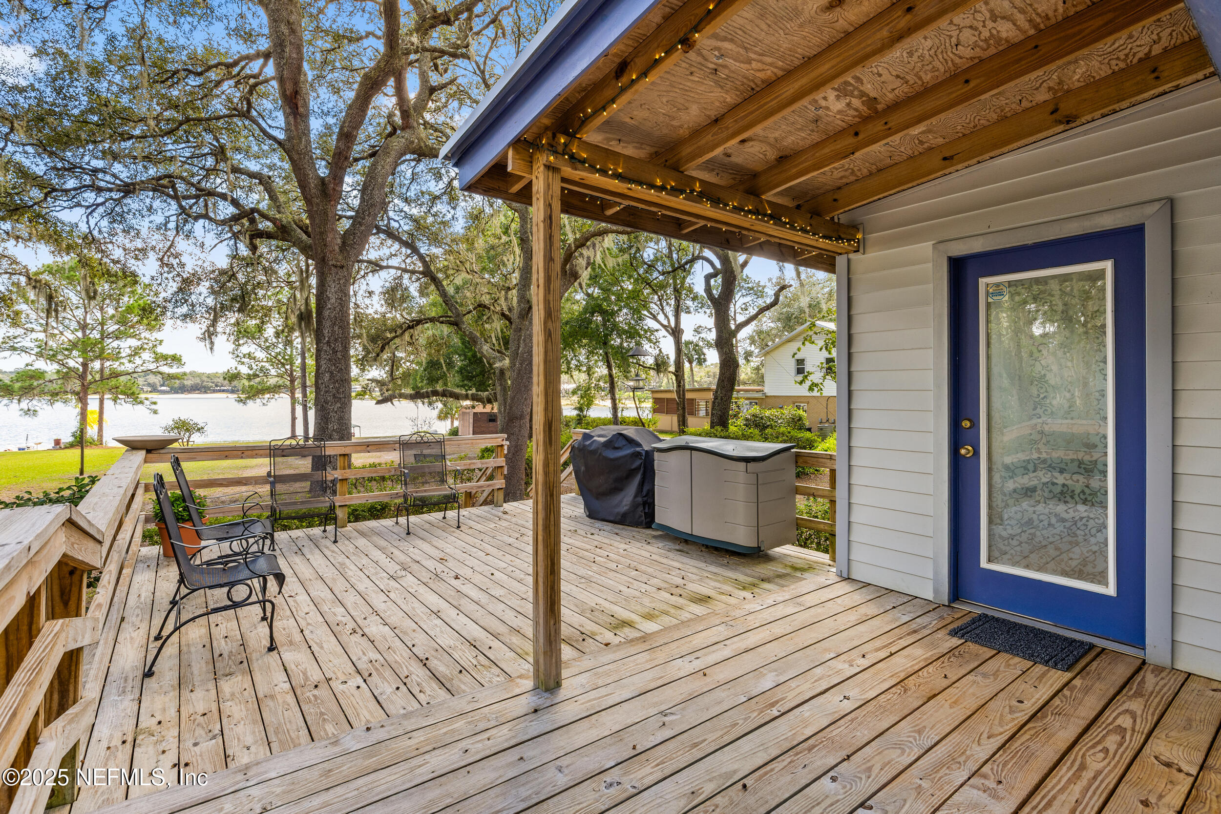 6441 Baker Road Keystone Heights, FL 32656 - Photo 39 of 66 a view of a swimming pool with seating area