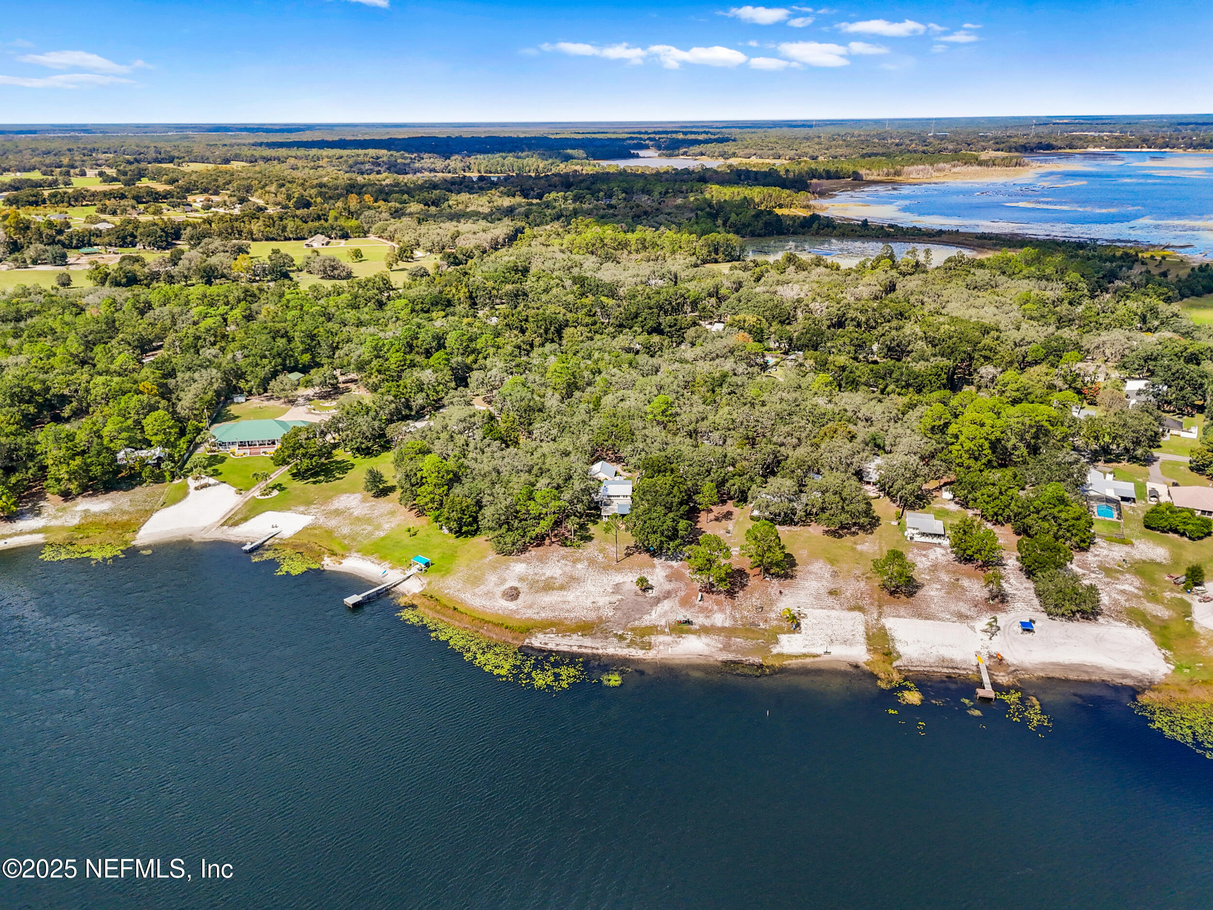 6441 Baker Road Keystone Heights, FL 32656 - Photo 58 of 66 a view of a lake from a yard