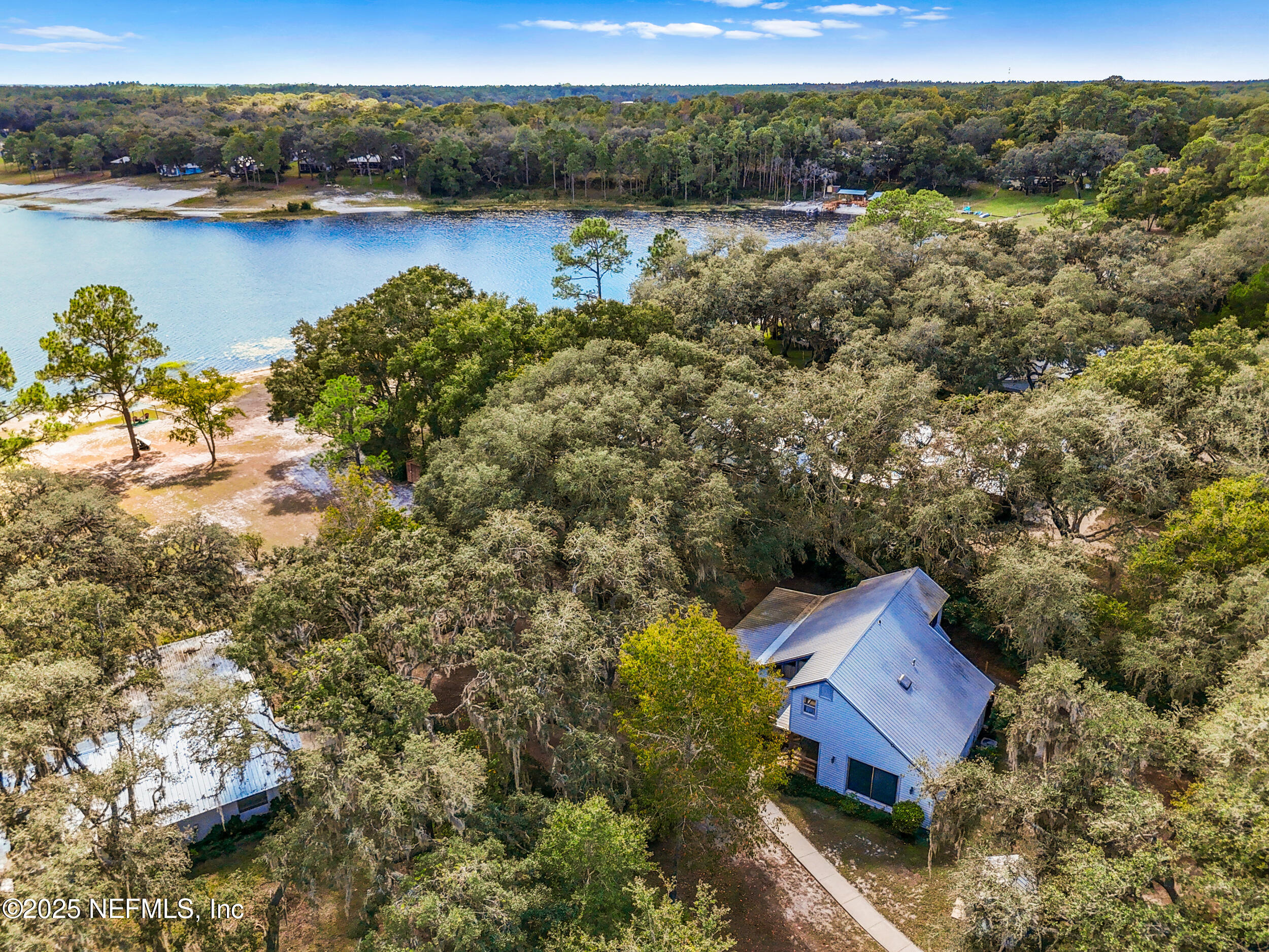 6441 Baker Road Keystone Heights, FL 32656 - Photo 62 of 66 a view of a lake with a mountain view