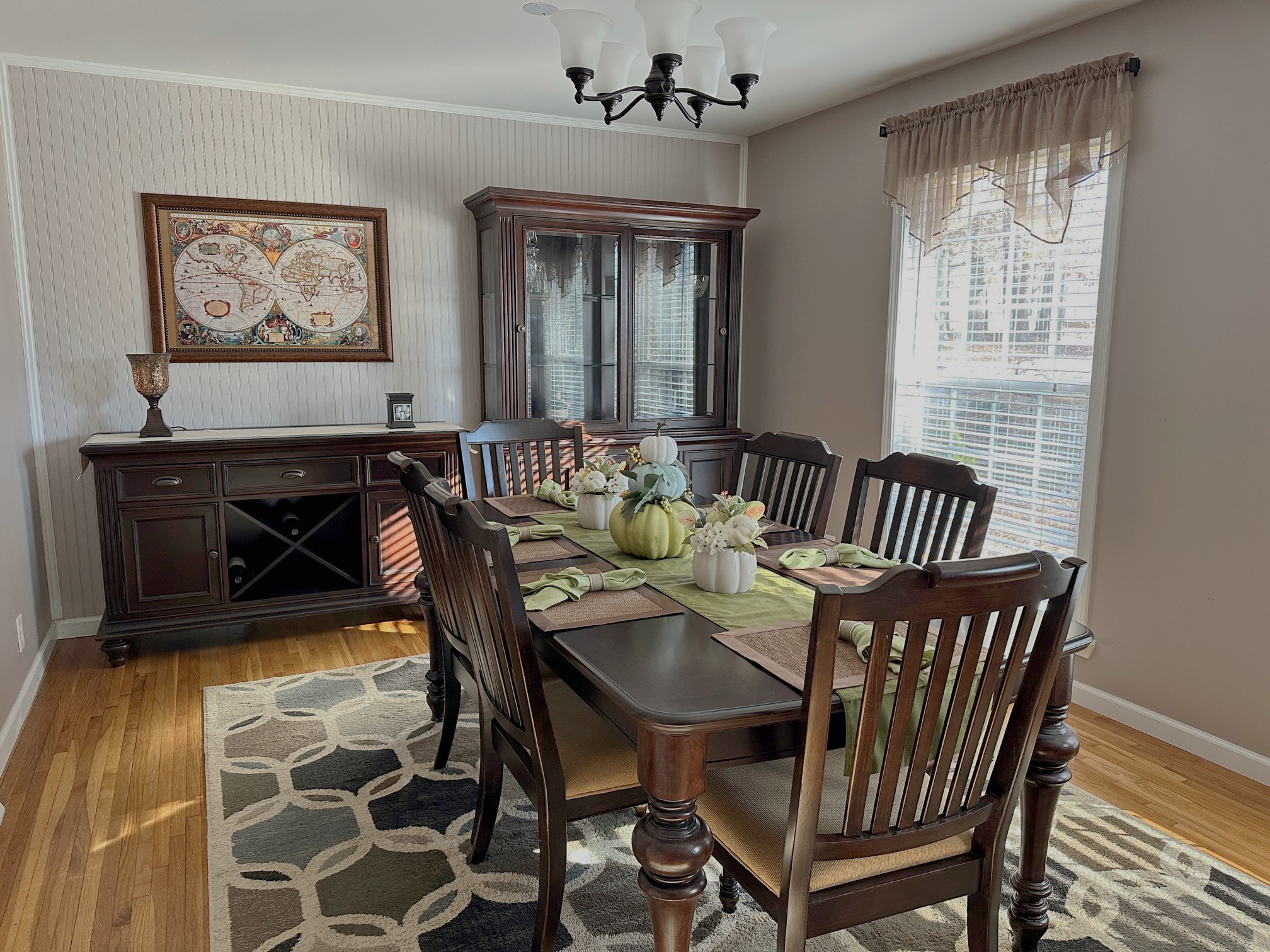303 Raintree Drive Hendersonville, TN 37075 - Photo 15 of 36 a view of a dining room with furniture and chandelier